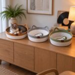 rope-cat-basket-caramel-gray-green Caramel, gray and green rope cat basket beds on a dining room sideboard, a cat curled in the caramel one