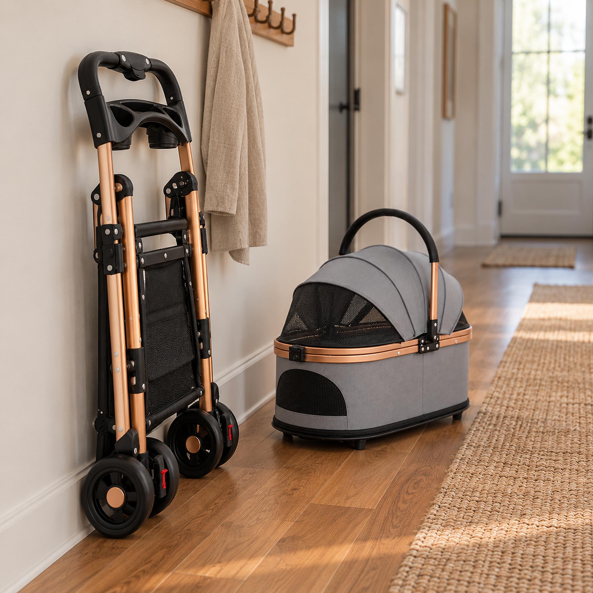 Cat stroller frame folded flat and standing against a hallway wall, the carrier beside it