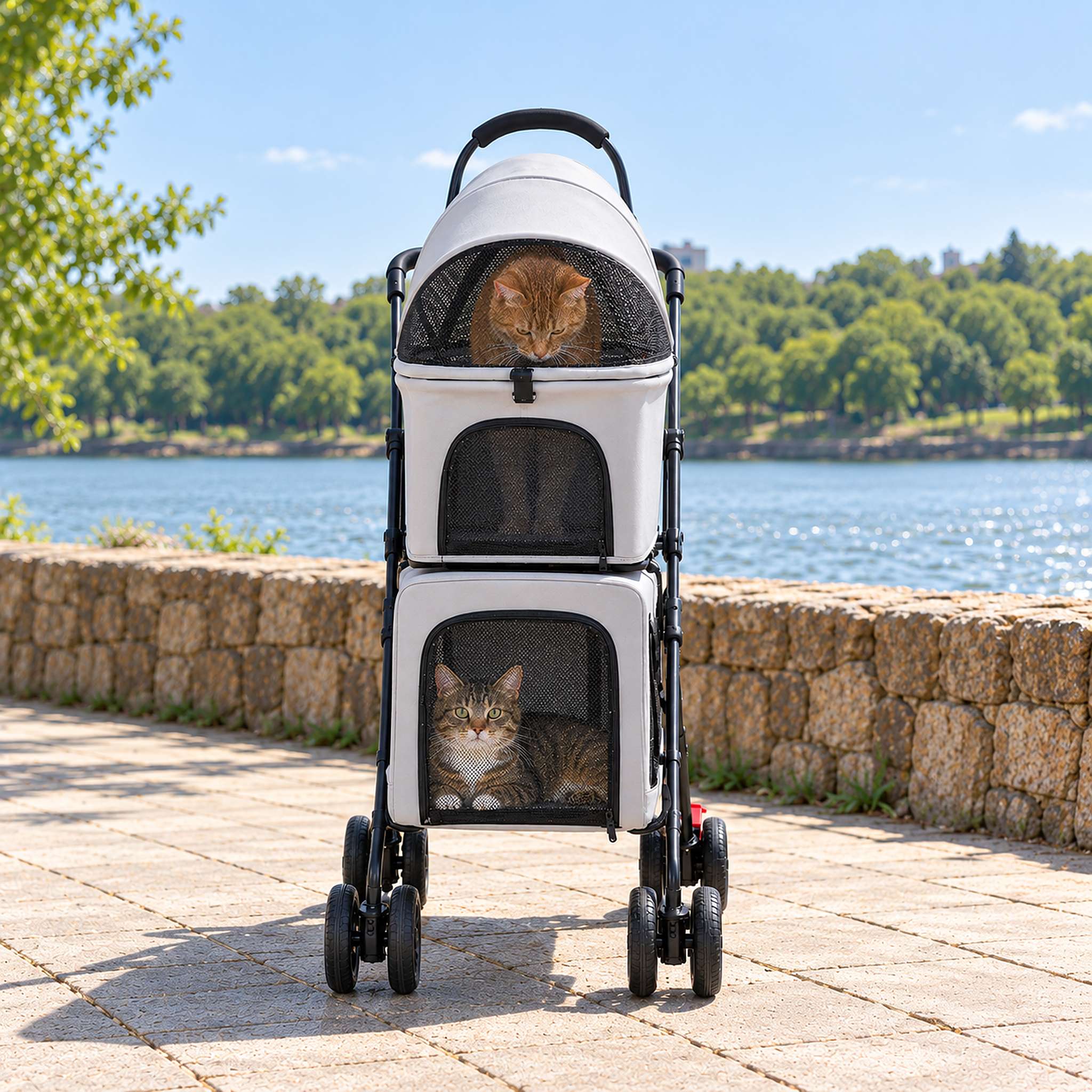 PurrVoyage Dual cat stroller with two carriers, an orange tabby in the top one and a brown tabby below